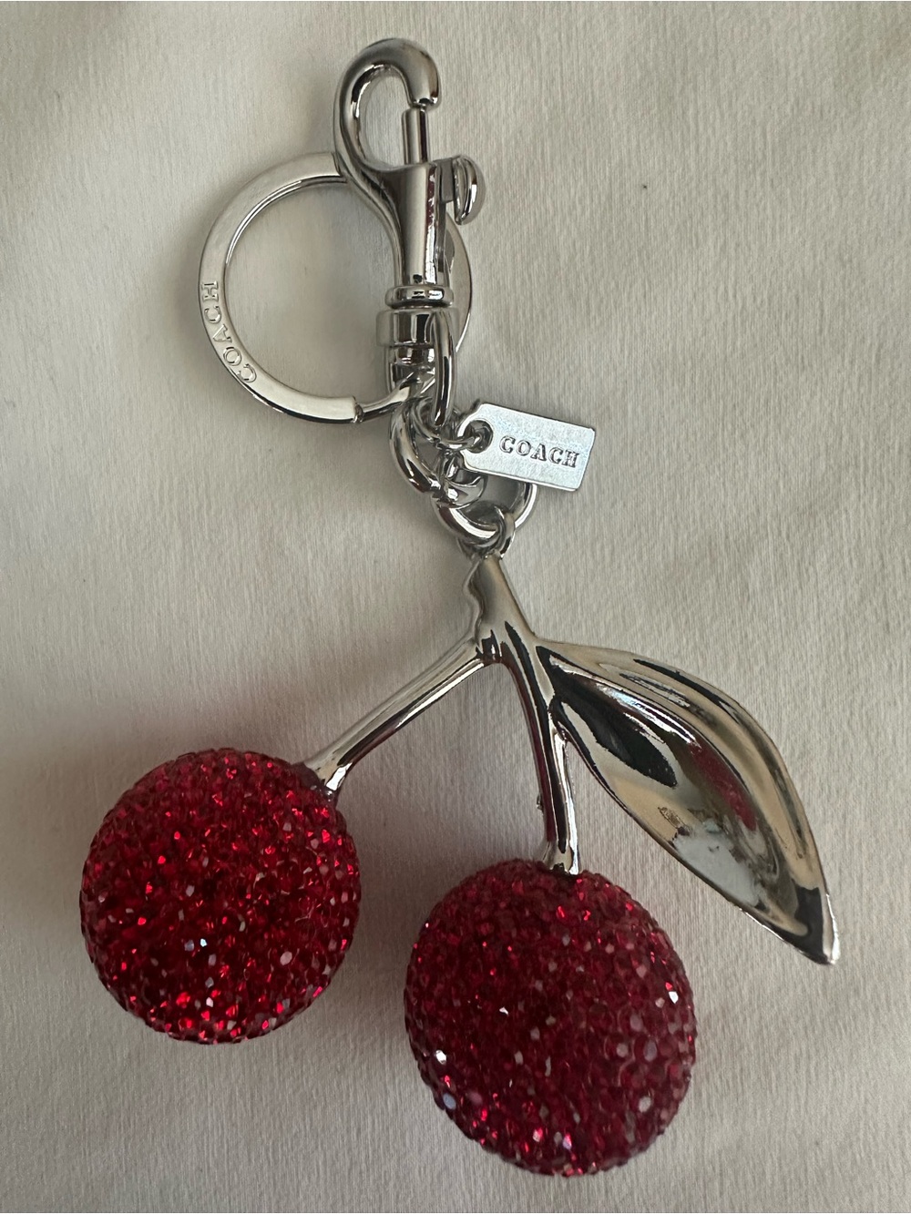 COACH Red Crystal Cherry Keychain Charm with Silver Hardware